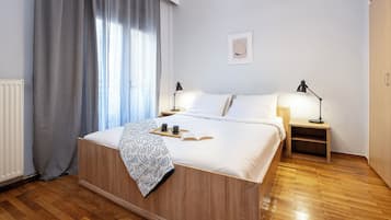 4 habitaciones, tabla de planchar con plancha y cuna de viaje