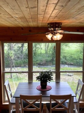 Dining - Timber Coulee Creek in backyard, king size bed, grill on deck,  large garage. (Westby)