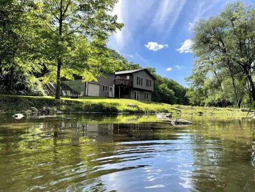 Timber Coulee Creek in backyard, king size bed, grill on deck,  large garage.