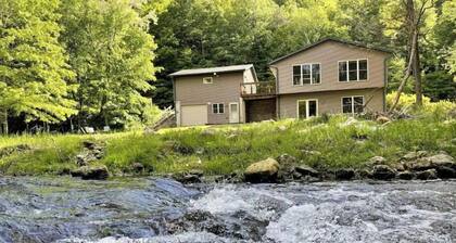 Timber Coulee Creek in backyard, king size bed, grill on deck, large garage.