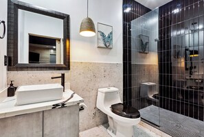 Bathtub, hair dryer, towels, soap