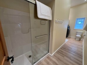 Bathtub, hair dryer, towels