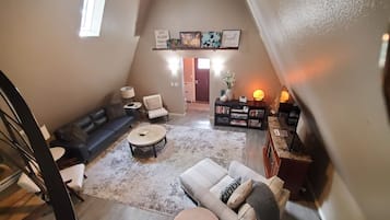 Smart TV, fireplace, books