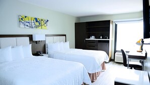A hotel room with two beds, a desk, a chair, a wardrobe, and a painting on the wall. - The Addison Hotel, SureStay Collection by Best Western (Addison)
