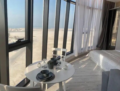 Apartment with a city view. Manama, Seef.