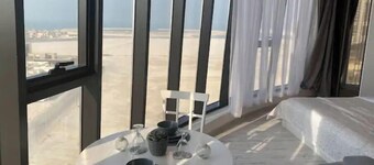 Apartment with a city view. Manama, Seef.