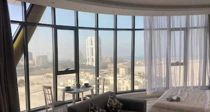 Apartment with a city view. Manama, Seef.