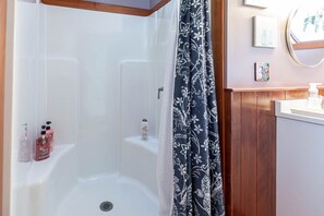 Shower, towels, soap, shampoo