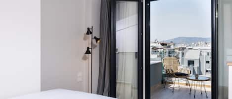 Suite Deluxe | 1 habitación, ropa de cama de alta calidad y cunas gratuitas