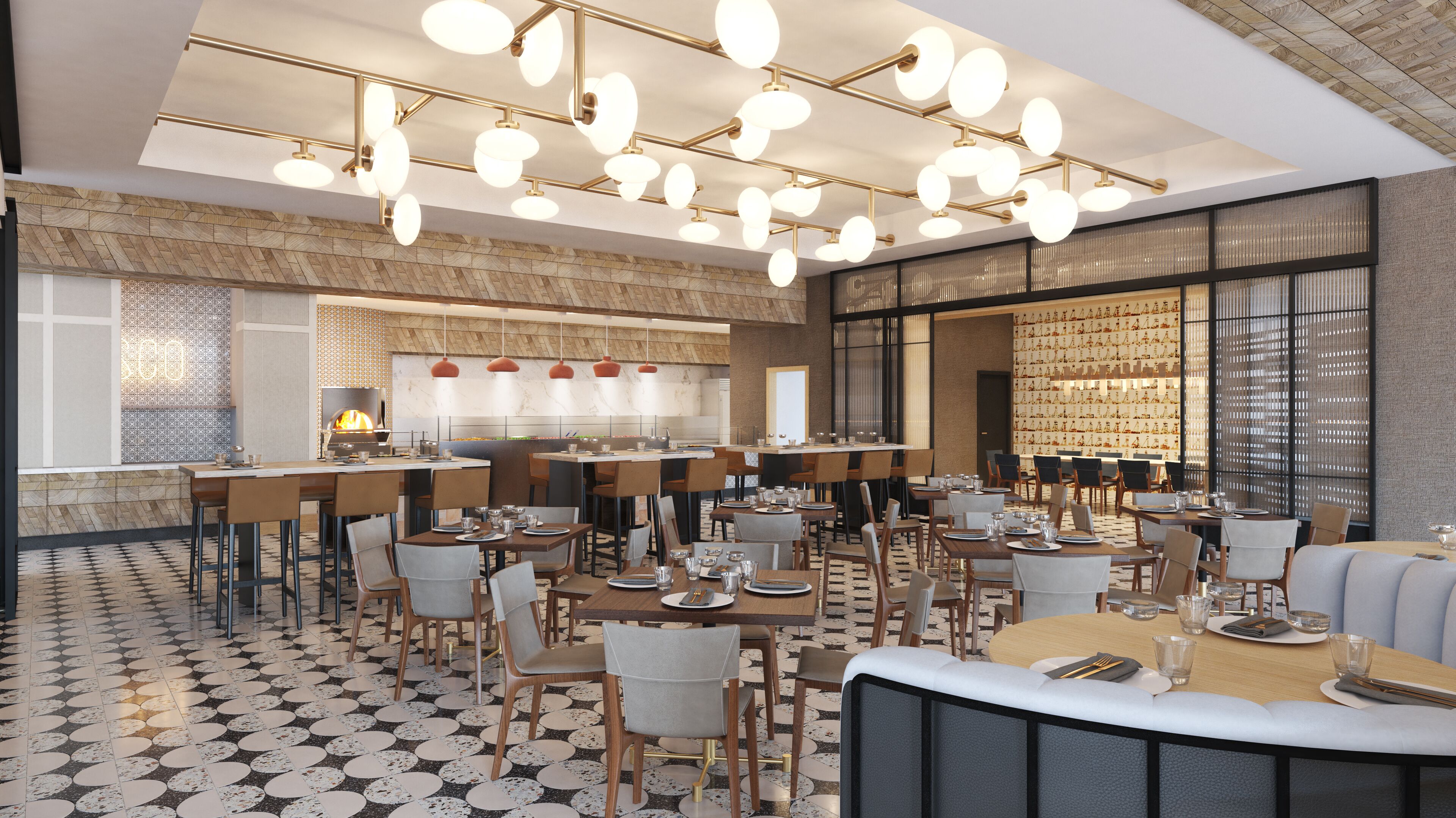 Un restaurant modern amb una barra central, diverses taules de menjador i un paviment amb dibuixos.