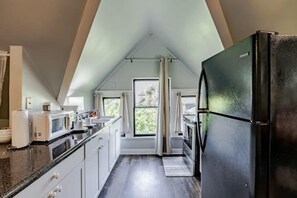 Fridge, microwave, stovetop, coffee/tea maker