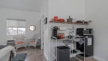Top Floor Suite | Private kitchen | Microwave, coffee/tea maker, electric kettle, cookware/dishes/utensils
