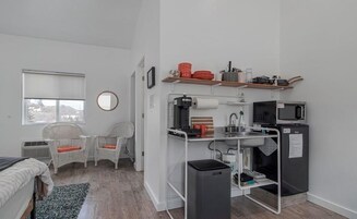 Top Floor Suite | Private kitchen | Coffee/tea maker, microwave, electric kettle, cookware/dishes/utensils
