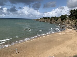 Beach nearby, sun loungers