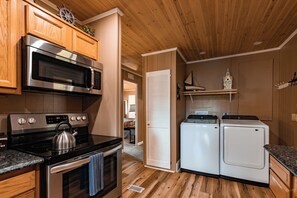Coffee/tea maker, fridge, microwave, oven