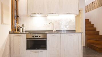 Fridge, microwave, coffee/tea maker, toaster