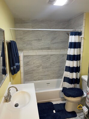 Hair dryer, towels, soap, shampoo