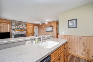 Combined shower/bathtub, hair dryer, towels, soap