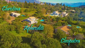 A residential area with houses labeled 'Christina,' 'Aphroditi,' and 'Cleopatra.' - Villa Christina in Poulades (Corfu)