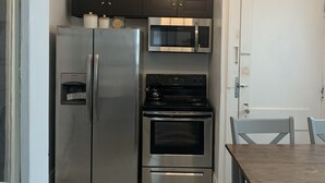 Coffee/tea maker, fridge, microwave, oven - Papa's Place Urban Cottage Retreat (Detroit)