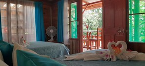 Quadruple Room, 2 Queen Beds | Living area