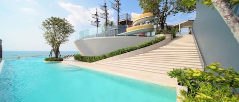 Outdoor pool, open 7:00 AM to 8:00 PM, pool umbrellas, sun loungers