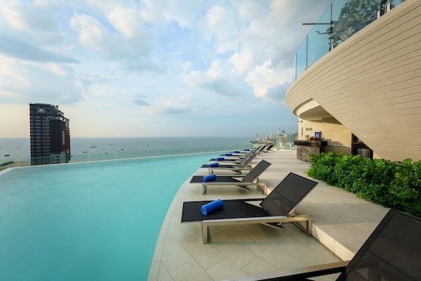 Outdoor pool, open 7:00 AM to 8:00 PM, pool umbrellas, sun loungers