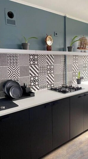 Fridge, freezer, dining tables