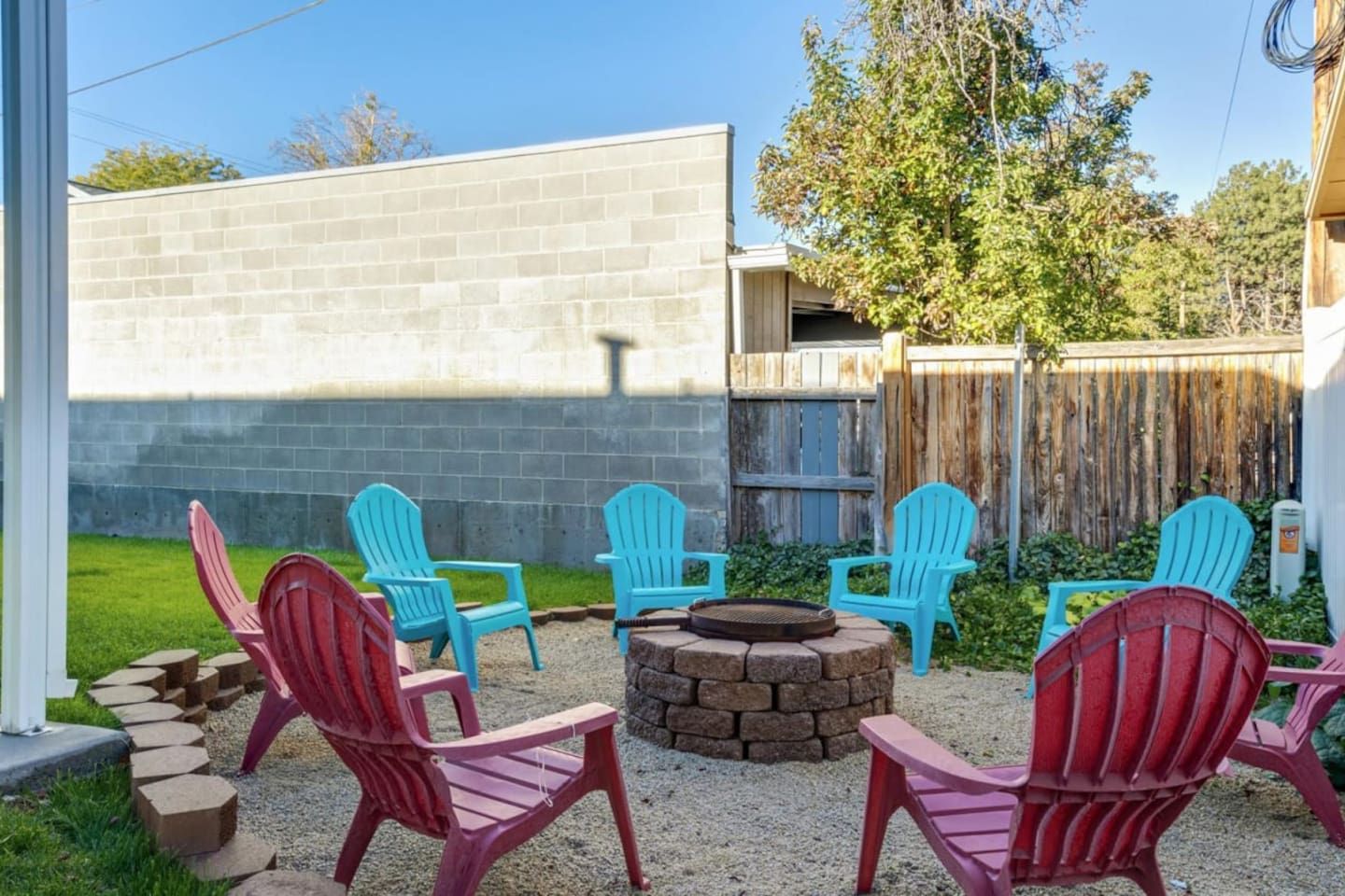 Fire pit with Adirondack chairs