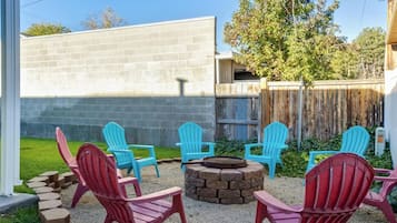 Fire pit with Adirondack chairs