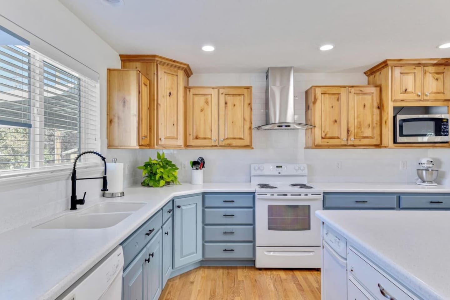 Kitchen sink, range, and microwave