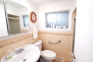 Shower, hair dryer, towels, soap