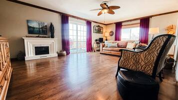 Smart TV, fireplace, table football, books