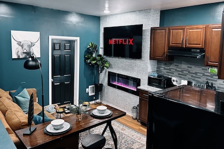 Smart TV, fireplace. The Cozy Getaway Suite