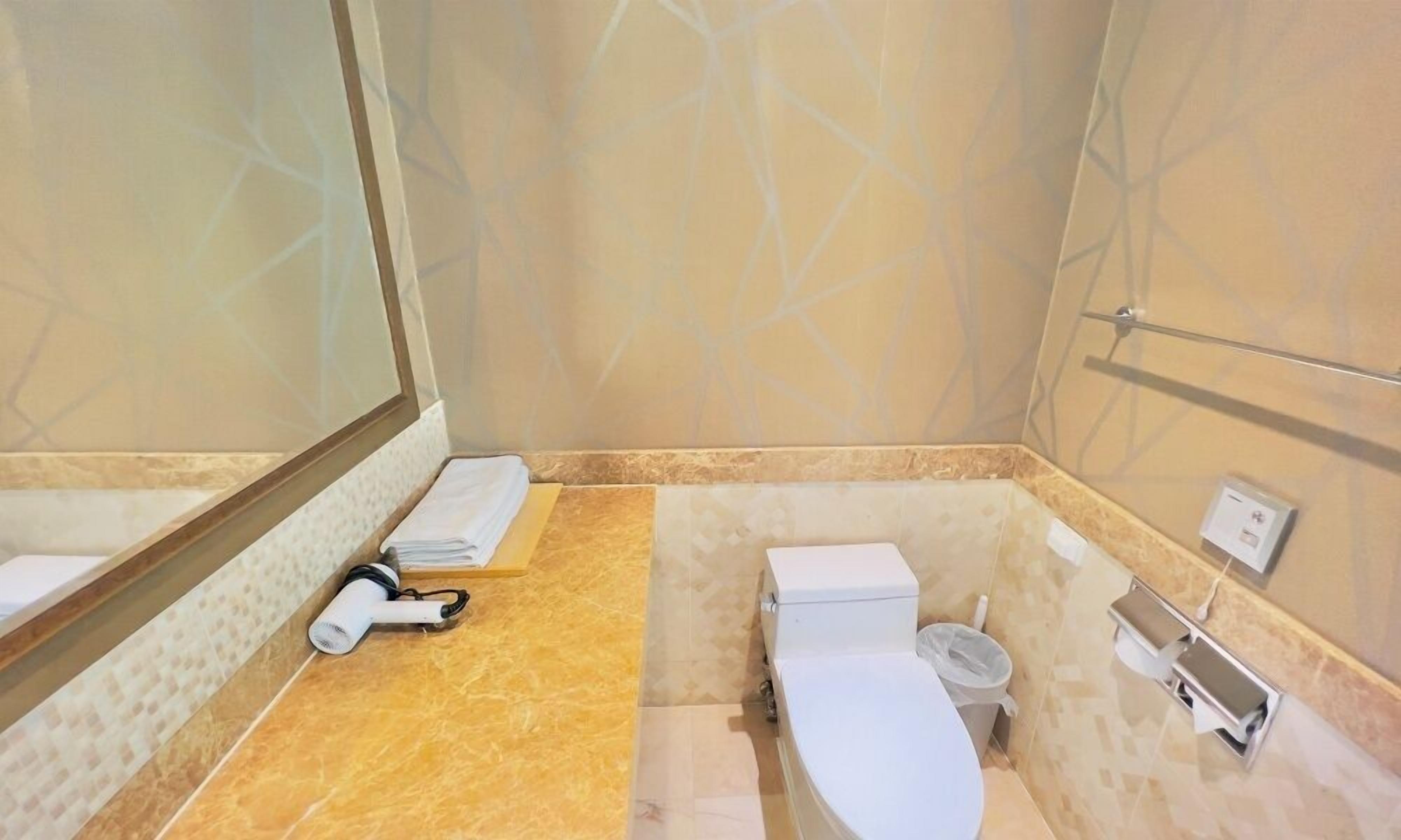 Hair dryer, towels, soap, shampoo