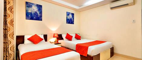 Basic Triple Room | Minibar, desk, laptop workspace, free WiFi