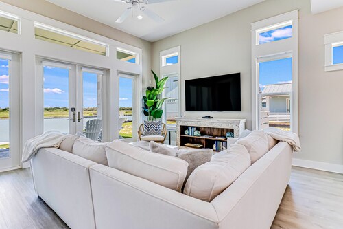 Enchanting waterfront home with dock, game room, central AC, & washer/dryer