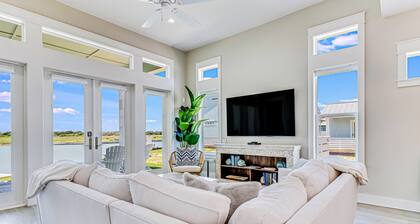 Enchanting waterfront home with dock, game room, central AC, & washer/dryer