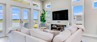 Enchanting waterfront home with dock, game room, central AC, & washer/dryer
