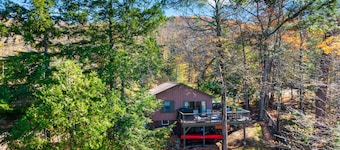 Scenic lakefront retreat with water access, private dock, grill, W/D & fireplace
