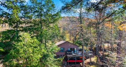 Scenic lakefront retreat with water access, private dock, grill, W/D & fireplace