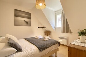 2 dormitoris i roba de llit