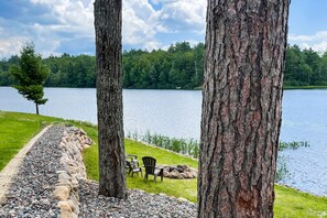 Property grounds - Lakefront home with private dock, deck, fireplace, firepit, canoe & paddleboat (Sayner)