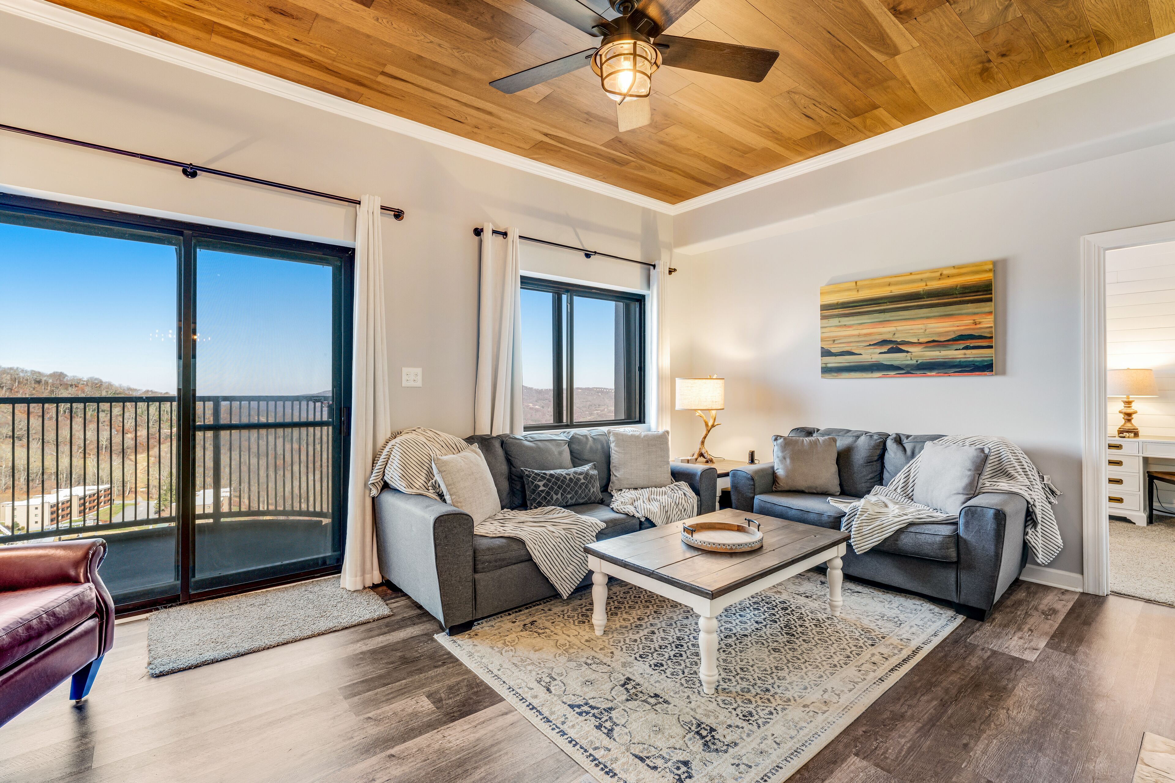 Mountain-view condo near elevators with heated pool, sauna, gym, tennis, hot tub