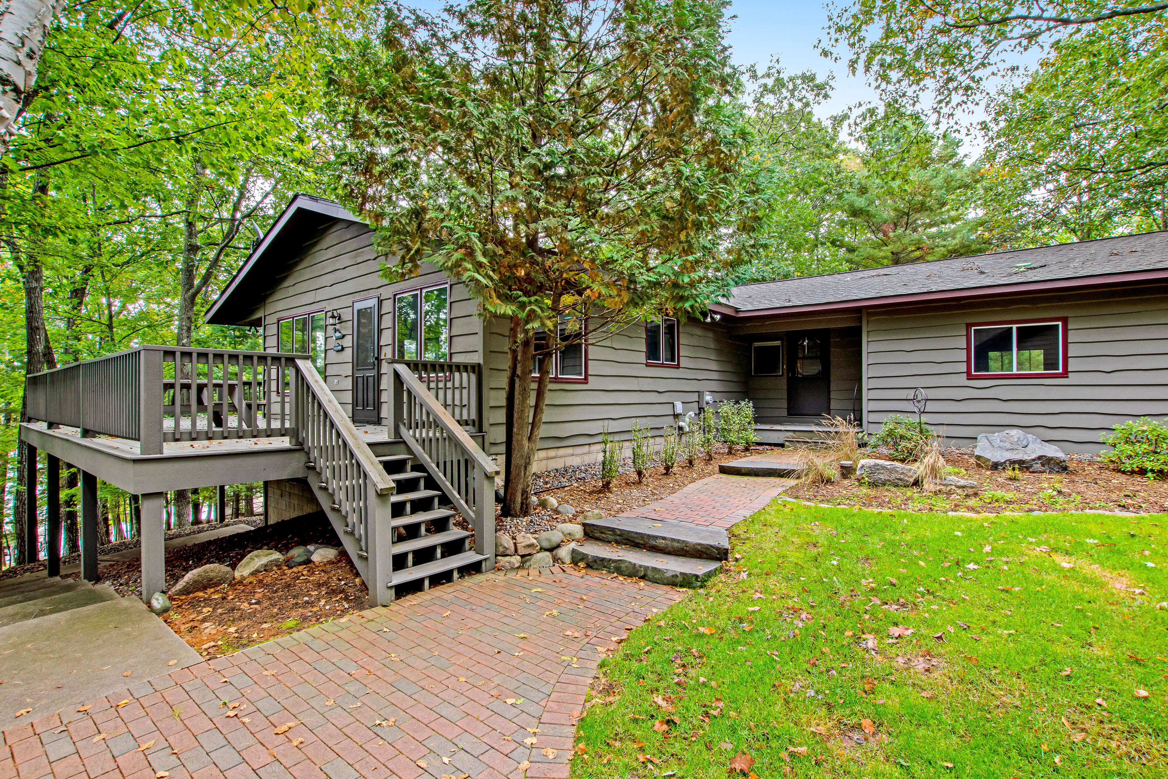 Lakefront home with a private dock, firepit, fast WiFi, washer/dryer, central AC