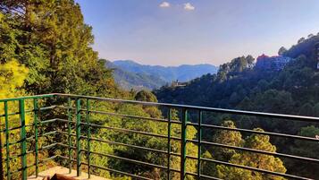 Quarto luxo | Vista para a montanha