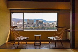 Interior - This is a single building rental of a Kyomachiya that has been in existence since the Meiji Era (1868-1912). The window overlooks the Kamo River and the town of Gion, making it a prime location to enjoy the typical Kyoto scenery. (Kyoto)