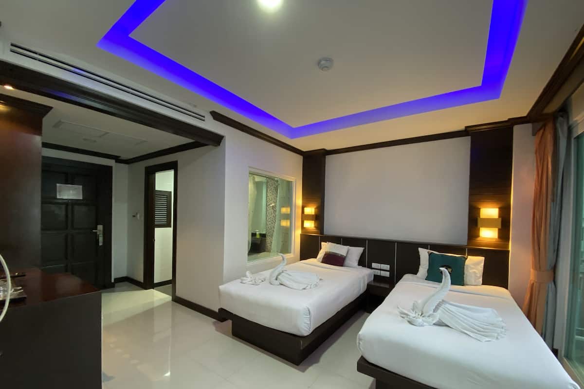 Deluxe Quadruple Room, 2 Bedrooms, Non Smoking, City View | 1 bedroom, premium bedding, minibar, in-room safe