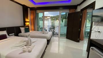 Deluxe Quadruple Room, 2 Bedrooms, Non Smoking, City View | Premium bedding, minibar, in-room safe, desk