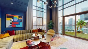 Superior Apartment | Living area | 80-inch flat-screen TV with cable channels, TV, streaming services